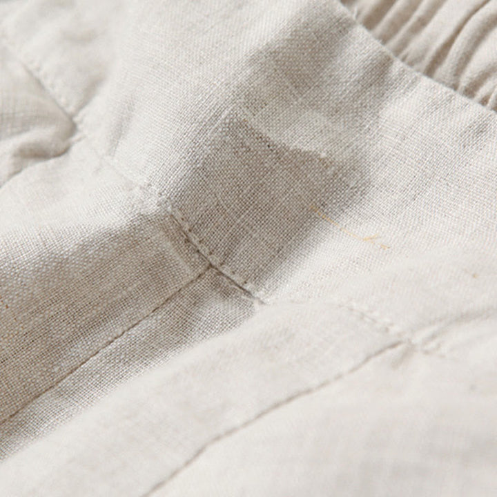 Petra — High-Rise Pleated Wide-Leg Trousers