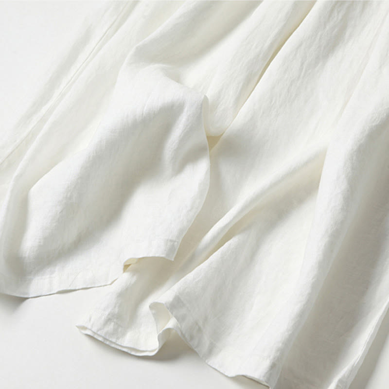 Petra — High-Rise Pleated Wide-Leg Trousers