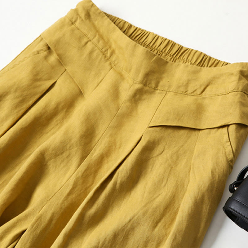 Petra — High-Rise Pleated Wide-Leg Trousers