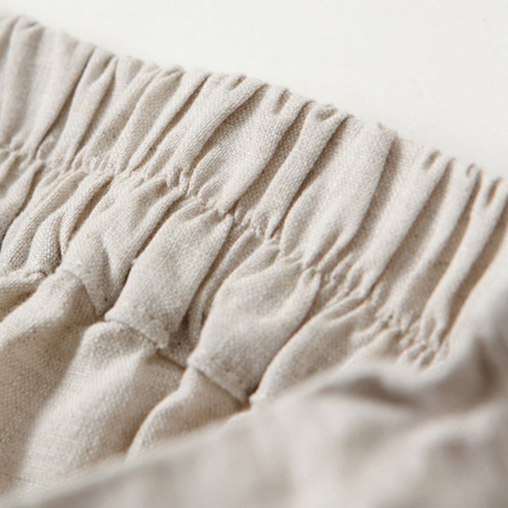 Petra — High-Rise Pleated Wide-Leg Trousers