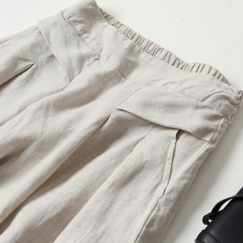Petra — High-Rise Pleated Wide-Leg Trousers