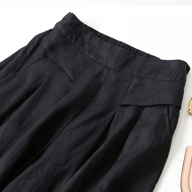 Petra — High-Rise Pleated Wide-Leg Trousers