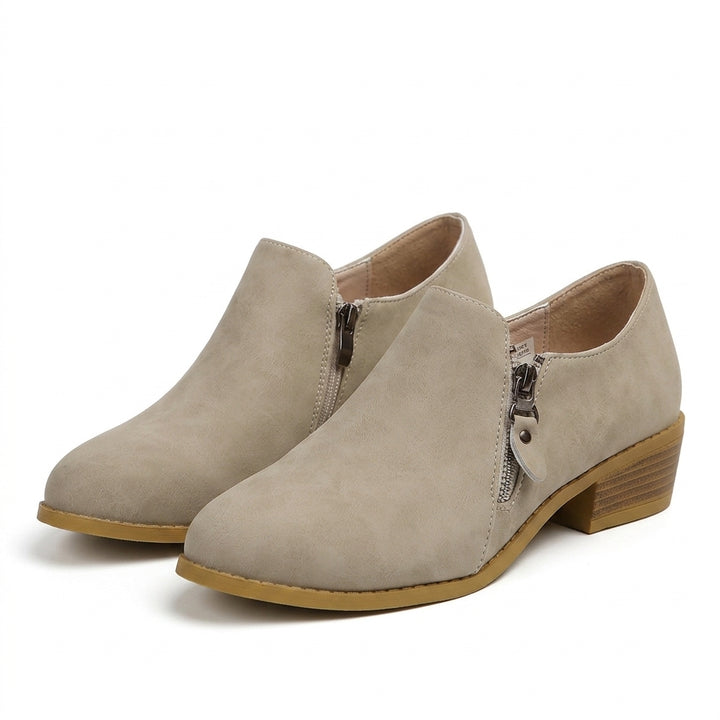 Side-zip ankle boots — Studio - Clean | Generated by Modelize
